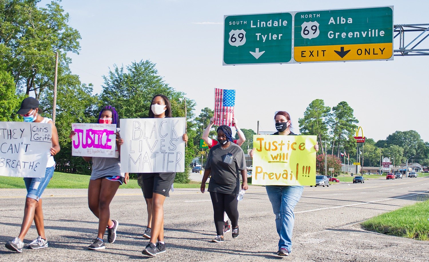 Marchers heading north along Hwy. 37 on Thursday.
